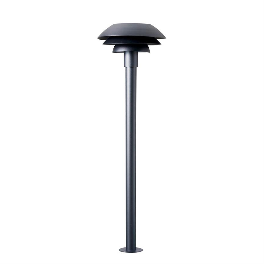 A modern, dark gray bollard lamp stands vertically; its three layered screens shield and control downward light in a clean, white studio background.