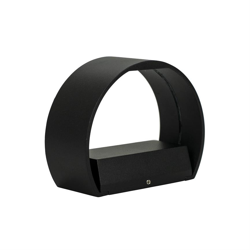 Black circular wall lamp, curved frame encloses a rectangular light source and is designed to cast light downwards; presented against a neutral white background.