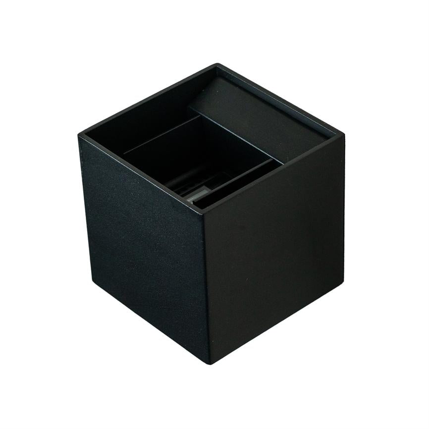 Black cube-shaped container with open top and interior compartments/dividers (object), standing empty (action) on a pure white background (context).