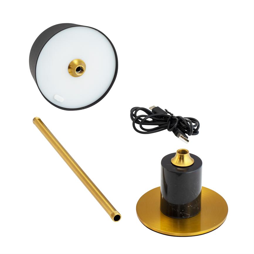 Table lamp stands apart: round white shade with black border, gold-colored metal rod, black marble base with gold detail and USB cable, placed on a white background.