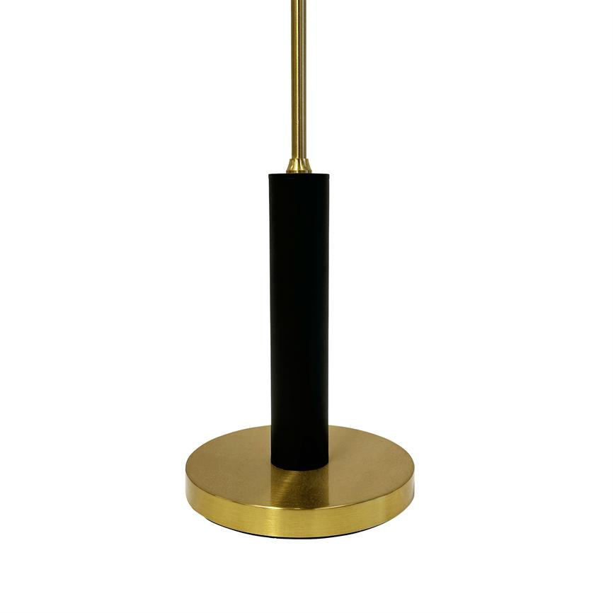 Lamp base with round brass base and black cylindrical stem, standing upright and carrying a slim brass rod on a solid white background.