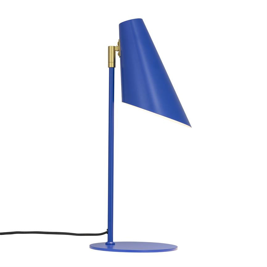 A blue table lamp with slanted, conical shade leans forward; the screen is mounted on a thin vertical rod with a round base, black power cord lies against a white background.