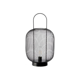Black metal mesh lantern houses a visible decorative bulb and has a hanger for hanging; standing on a round base against a uniform white background.