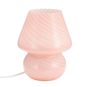 A pink mushroom-shaped glass lamp with spiral stripes; made of two connected curved parts, stands on a white background with visible white wire at the base.