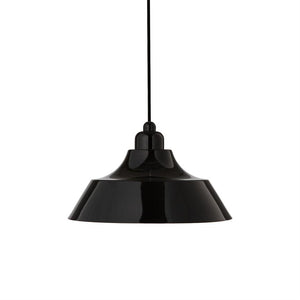 Black metal pendant hangs from a narrow black cord over a white background; round, wide-shielded shape with downward-sloping edge and glossy, light-reflecting surface.