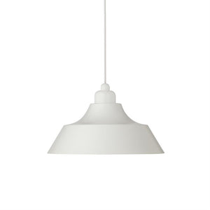 A white pendant lamp hangs from a thin cord above a neutral white background; simple domed shade with soft curves and matte finish, suitable for kitchen or dining room.