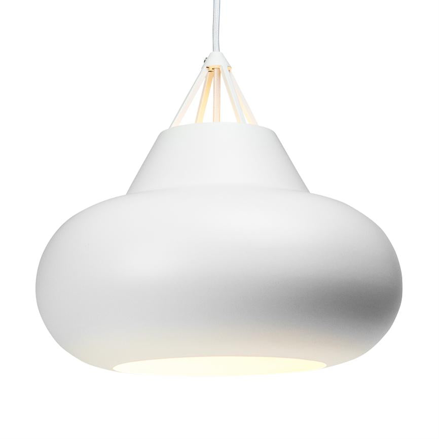 A white pendant lamp hangs from a fabric cord and casts soft, warm light downwards; round, matte screen with narrow suspension struts, photographed against a neutral white studio background.