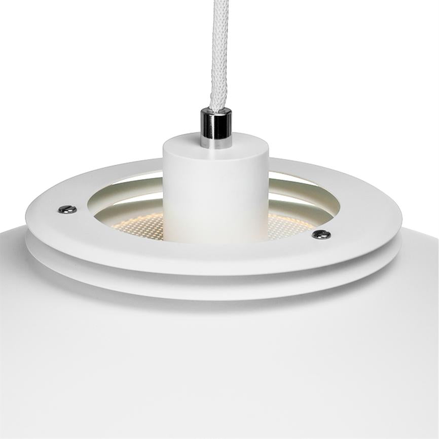 A white pendant lamp hangs from a braided cable; cylindrical socket sits in a round top with visible screws and perforated diffuser that emits soft, warm light against a neutral background.