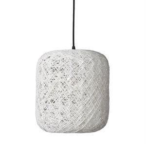 A white, cylindrical braid pendant hangs from a black cord; cord-like structure forms a dense net around the bulb against a neutral white background.