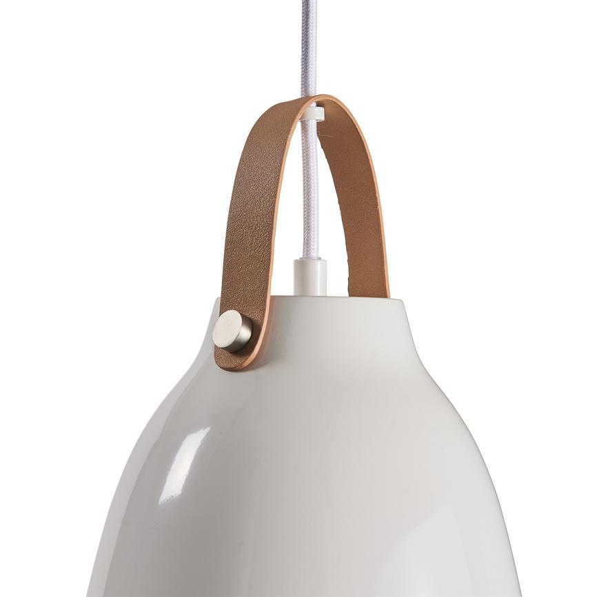A white pendant lamp hangs from a white textile cable; it has a brown leather strap attached with metal rivets and is shown in close-up against a neutral white background.