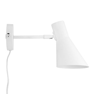 Wall lamp with conical shade, mounted on a round plate; arm extends horizontally, screen is angled downwards, and a fabric-covered cord hangs freely against a plain white background.