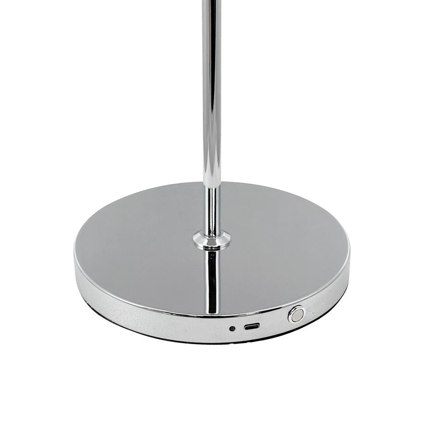 Round, mirror-gloss chrome lamp base stands on a white background; it has a vertical bar, a round power button, a small hole (LED) and a USB port along the edge.