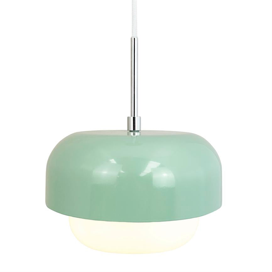 A mint green pendant hangs from a chrome bar; a round, glossy dome conceals a white opal diffuser that emits soft light against a white background.