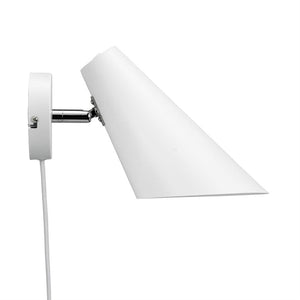 Wall lamp with a white, cone-shaped shade pointing diagonally forward, mounted on a round white wall plate via chrome joints; white fabric cable hangs vertically against uniform white background.