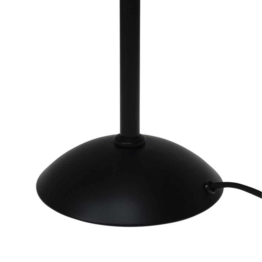Object: Black metal lamp base. Action: Narrow round rod protrudes upwards, textile power cable is led out to the right. Context: Minimalistic, uniform white background.