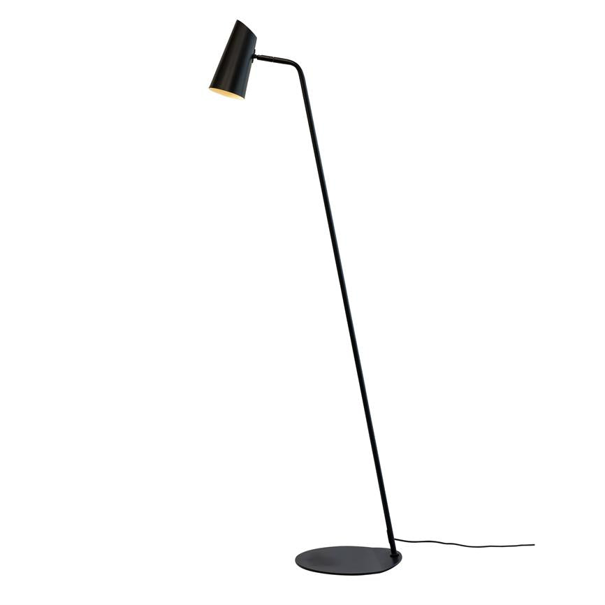 Black floor lamp with slim, curved arm, shade tilted downwards; round metal base and visible black cord on a neutral white background.