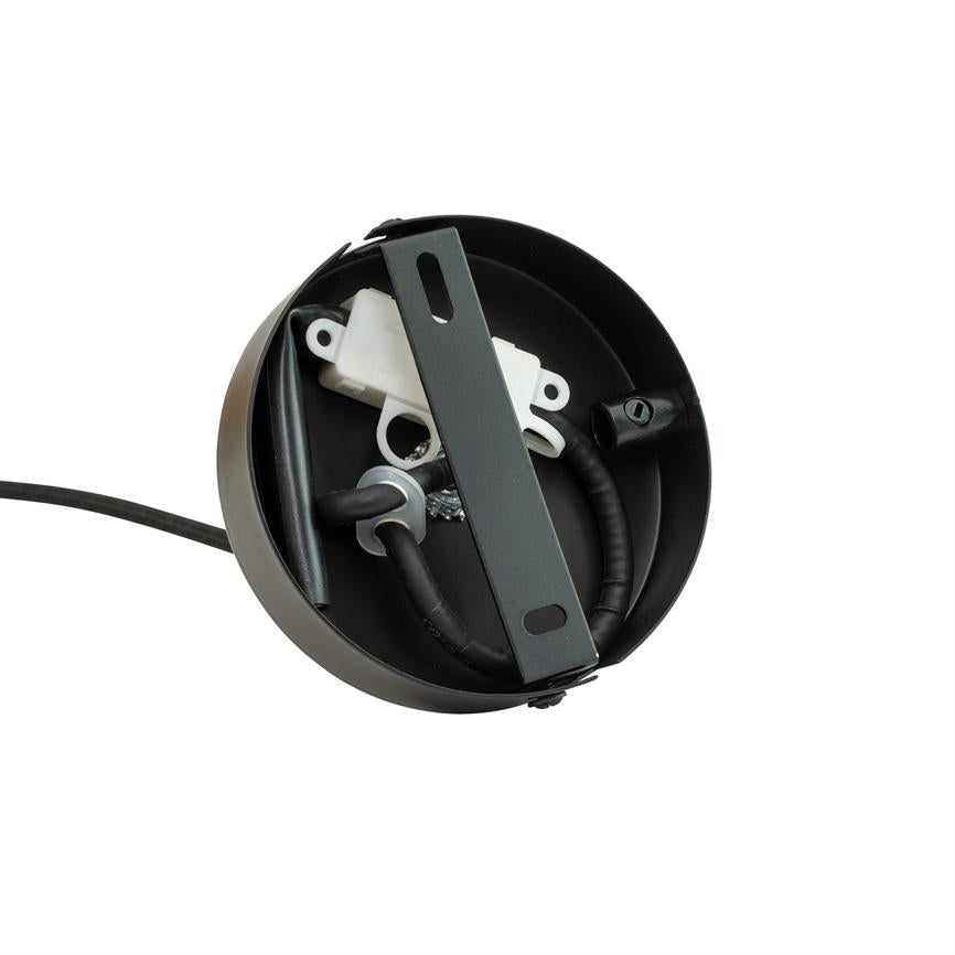Round black ceiling box with a metal mounting bracket across, coiled black wires, white plastic cable holder and screw connection, placed against a white background.