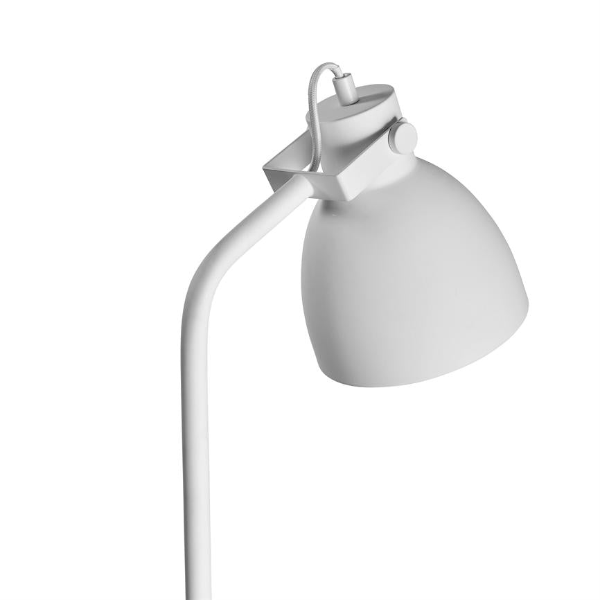 Floor lamp with curved rod and round shade; the lampshade is angled downwards; simple, matte white finish placed alone against a uniform white background.