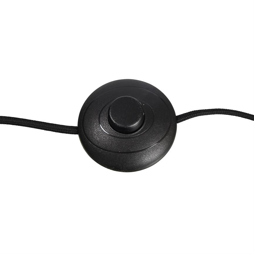 Round black foot switch with a central push button, connected to two black cloth-encased cables, lies flat on a white background.