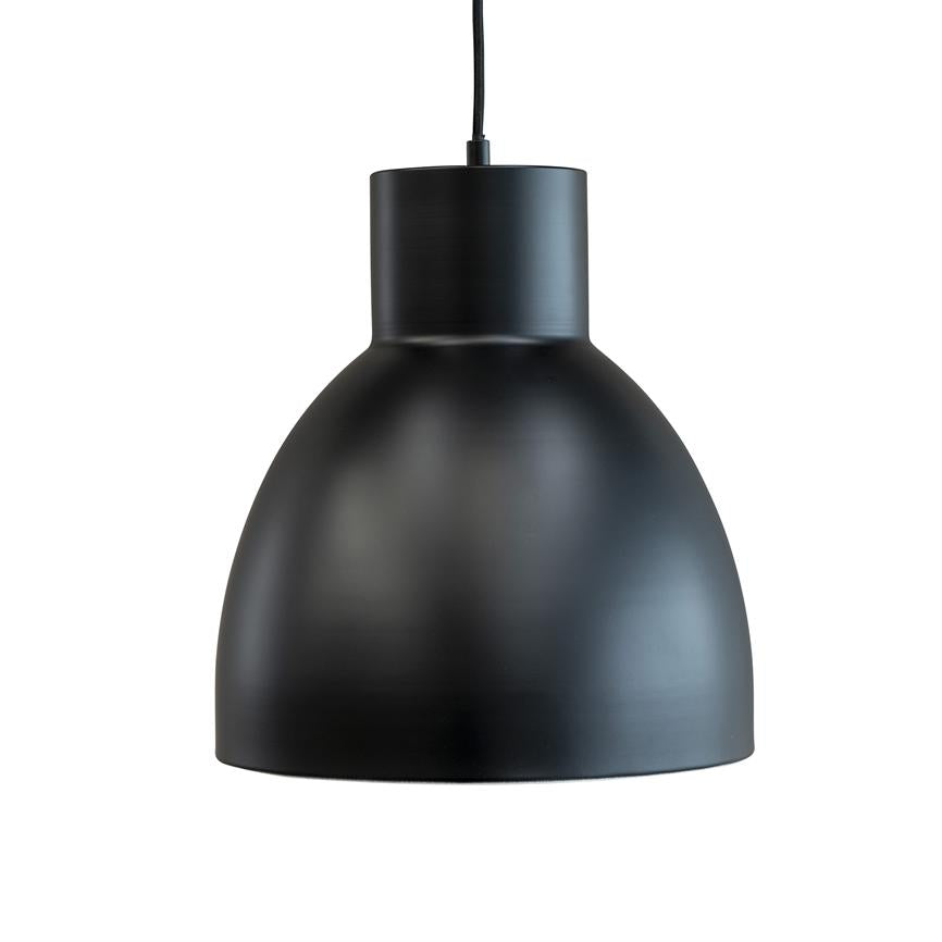 A black, dome-shaped hanging lamp hangs from a black wire with a matte metal surface, placed against a white, neutral background in a studio-like, isolated environment.