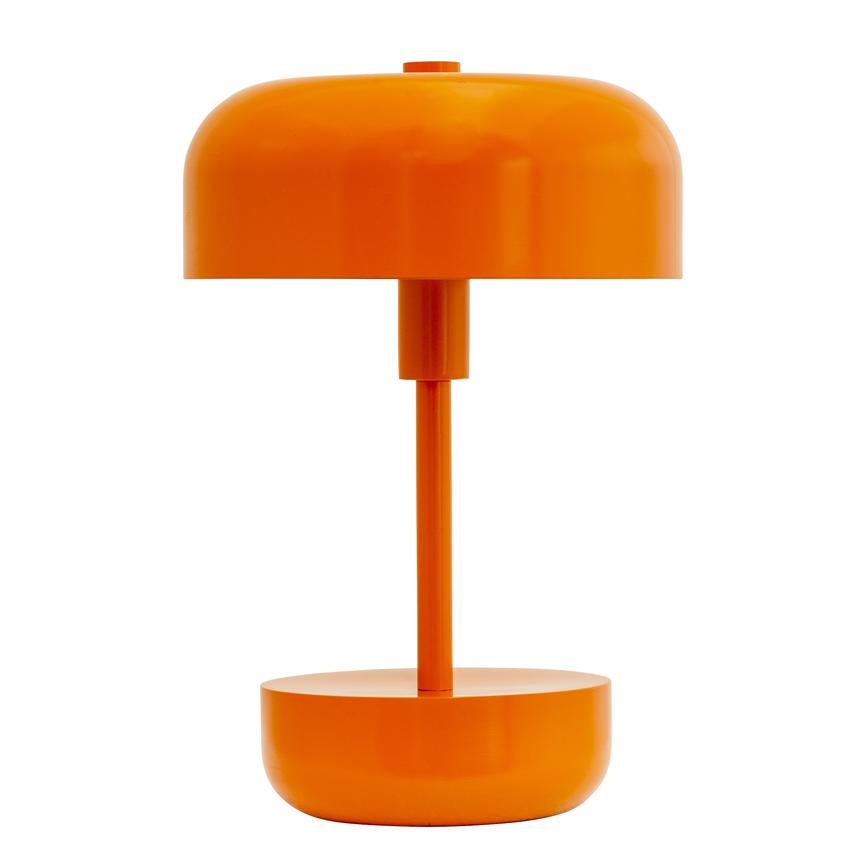 An orange table lamp stands; its round dome rests on a narrow pole above a compact round foot; minimalist design, placed against a uniform white background.