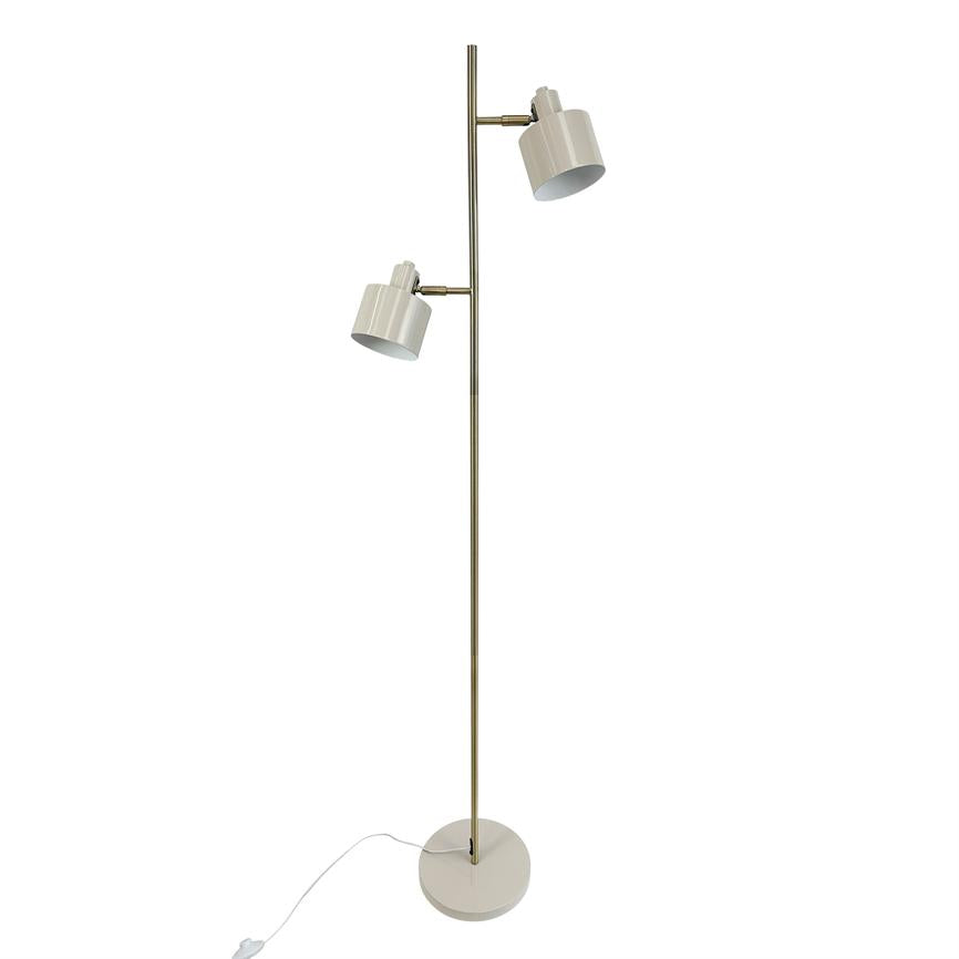 Floor lamp with two adjustable white shades, mounted on a tall, slender brass colored rod and round white base; the screens angled in different directions against a neutral white background.