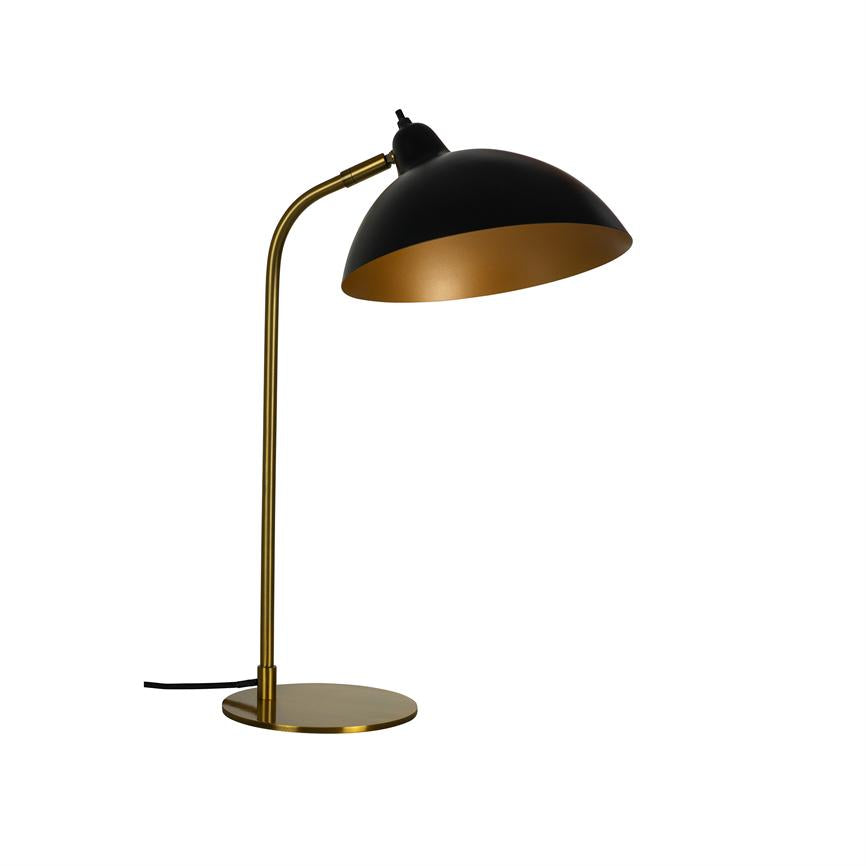 Black and gold colored table lamp with curved arm and round foot; the screen is facing downwards; stands isolated against a white background.