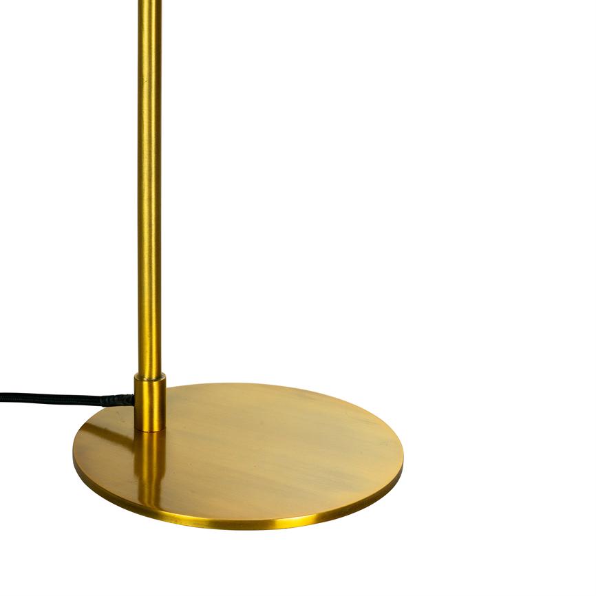 Gold colored lamp base with slender rod, standing vertically on a round base; a black cable runs from the foot to the left on a neutral white background.