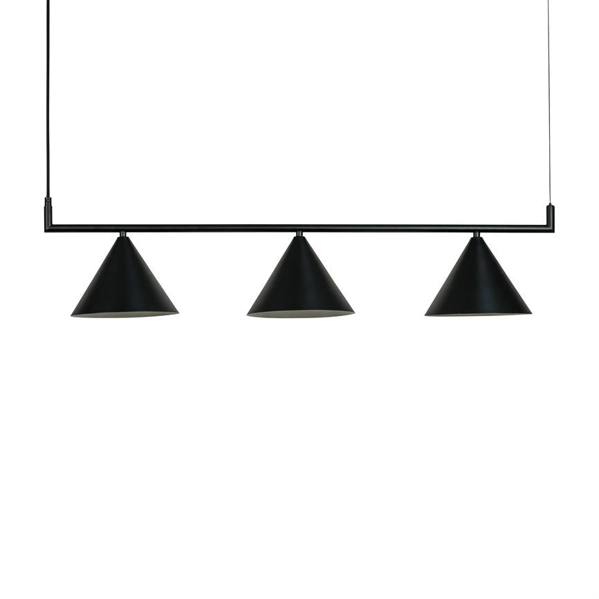 Black ceiling lamp with three cone-shaped shades, hanging from a straight metal rod; suspended by two thin cables above a uniform white, blank background.