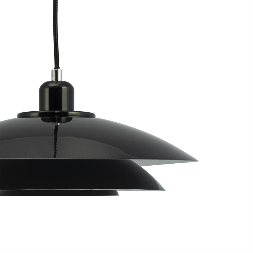 Black metal hanging lamp hangs from a black fabric covered cord, with three overlapping concave dome shades that reflect light, set against a pure white background.