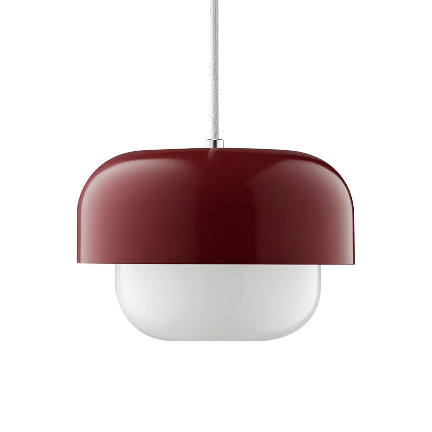 Ceiling lamp hangs from a white braided cord; glossy burgundy metal dome encloses a round, white opal diffuser, presented in front of a neutral white background.