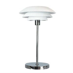 Table lamp with three layered white shades, slim chrome stand and round chrome base; stands upright on a plain white background in a minimalist, modern design.