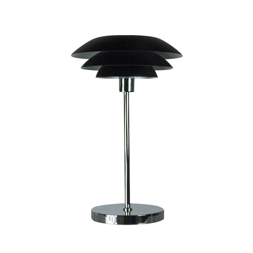 Table lamp with three stacked black rounded shades, mounted on a slim chrome rod and round chrome base; stands centrally against a uniform white background.
