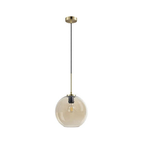 A glass pendant hangs from a black cable and a brass fitting; a golden glass sphere encloses a visible light bulb; shown against a neutral white background.