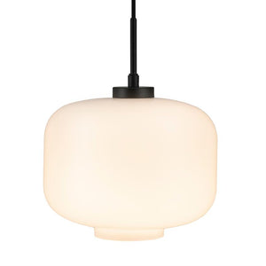 An opal white glass pendant hangs from a black cord and emits soft, diffused light against a neutral white background.