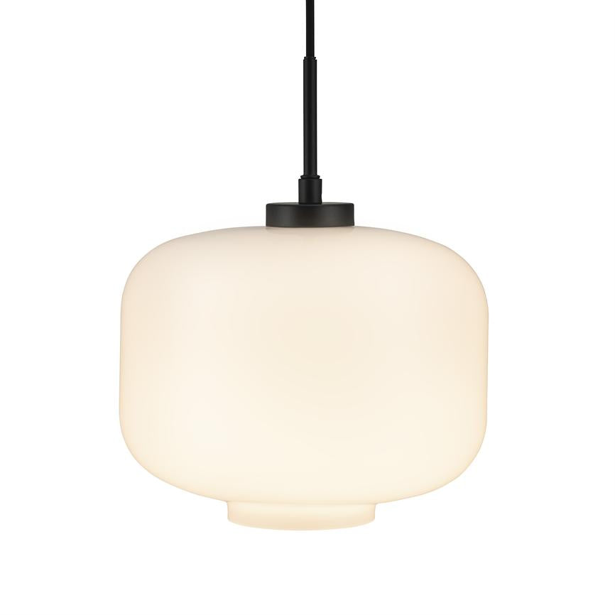 An opal white, rounded pendant lamp hangs from a black cord and emits soft, warm light; the motif is an isolated product photo on a white background.