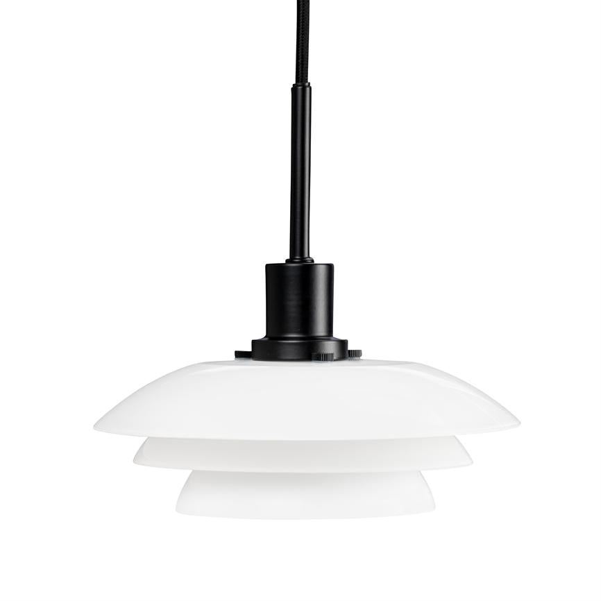 A white, layered pendant light hangs from a black cord; three flat, circular screens are stacked under a black socket against a neutral white background.