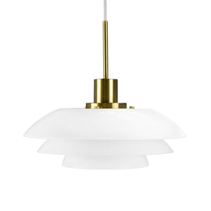 White, layered pendant in three round shades hang from a gold-colored socket and fabric cord; simple, modern lighting presented against a neutral white background.