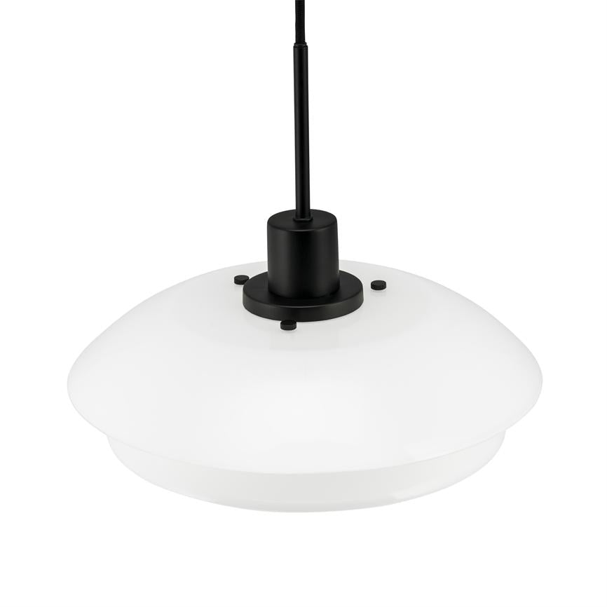 White, round pendant lamp (opal shade) hangs in a black cable and socket unit; black cylinder with three small discs on top, shown against a neutral white background.
