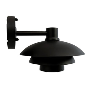 Matt black wall lamp mounted on round wall bracket, with three-layer shade, pointing downwards; metal arm holds the lamp, shown against a pure white background.