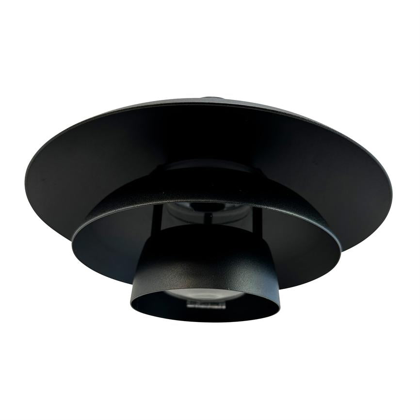 Black ceiling lamp with three concentric shades, seen from below; mounted against a white background, matt metal finish and visible central light source.
