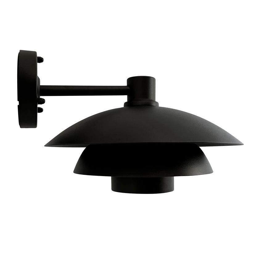 Black metal wall lamp mounted on a short arm; three layered screens shield the light; placed against a uniform white background.