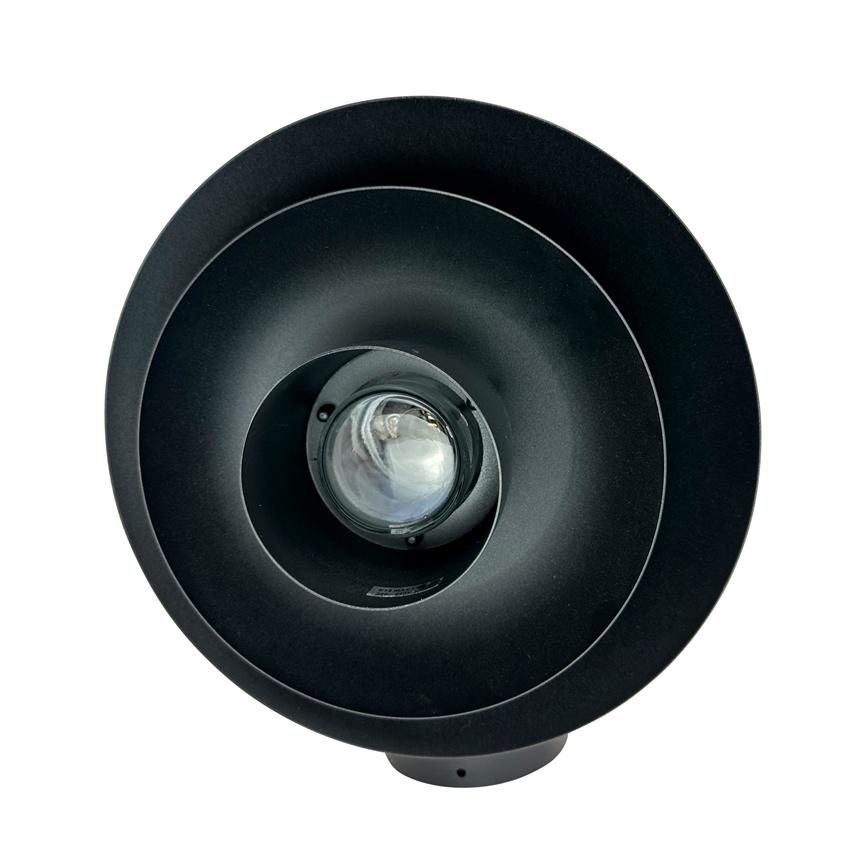 Black, round ceiling/wall lamp with conical reflectors, where a clear lens/bulb is visible in the centre; the lamp is seen from the front against a uniform white background.