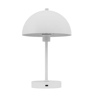 White table lamp with hemispherical shade, mounted on a slim rod and round base with USB-C port; stands centrally against a neutral white background.