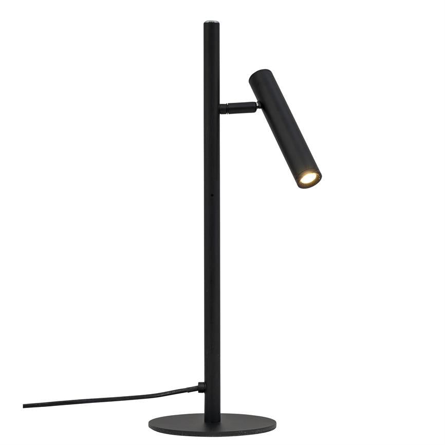 Black, slim desk lamp with cylindrical, adjustable lamp head that directs light downwards; mounted on a tall, thin pole and round foot, with visible power cable.
