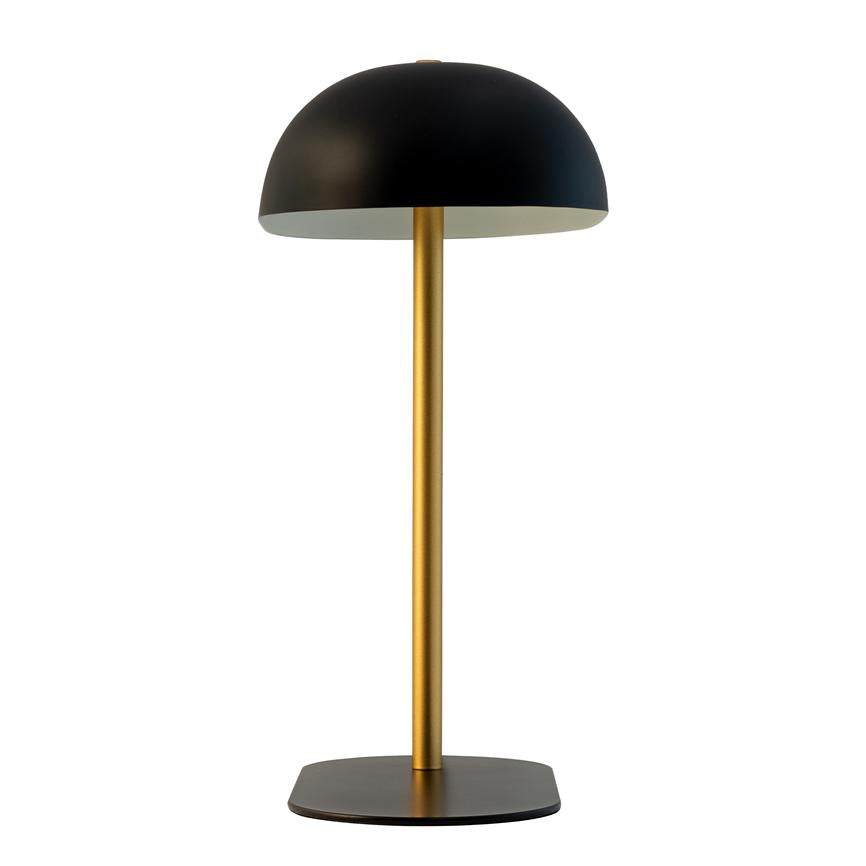 Black table lamp with hemispherical shade and gold-coloured rod stands unlit on a flat black base against a uniform white background.