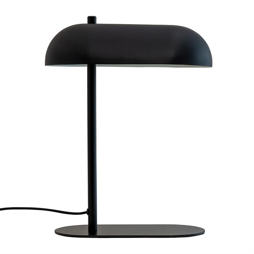 Table lamp with round, black dome — the shade rests on a thin, vertical rod; the lamp stands on an oval base, with cord extended to the left, against a white background.