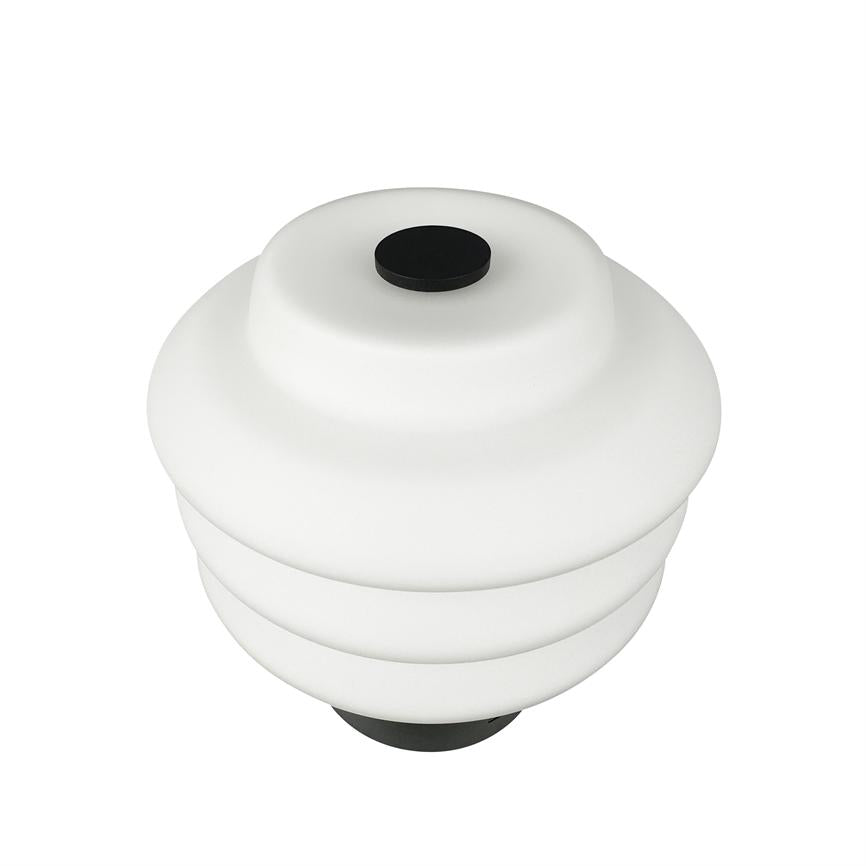 White, layered lampshade rests on neutral white background; three ring-shaped levels with black top and bottom fittings, minimalist, modern pendant lamp.