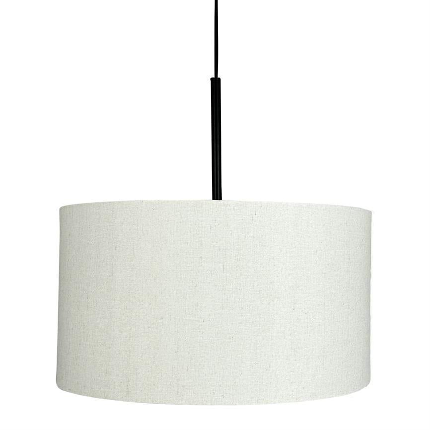 A cylindrical white fabric lampshade hangs from a black cord; it functions as a pendant lamp in a minimalist, bright room with a neutral, white background.