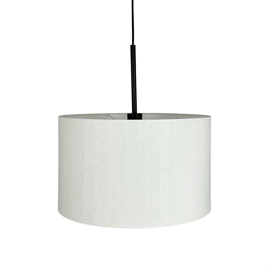 Cylindrical white lampshade hangs from a thin black cord; neutral fabric texture visible, center of an empty solid white background space.